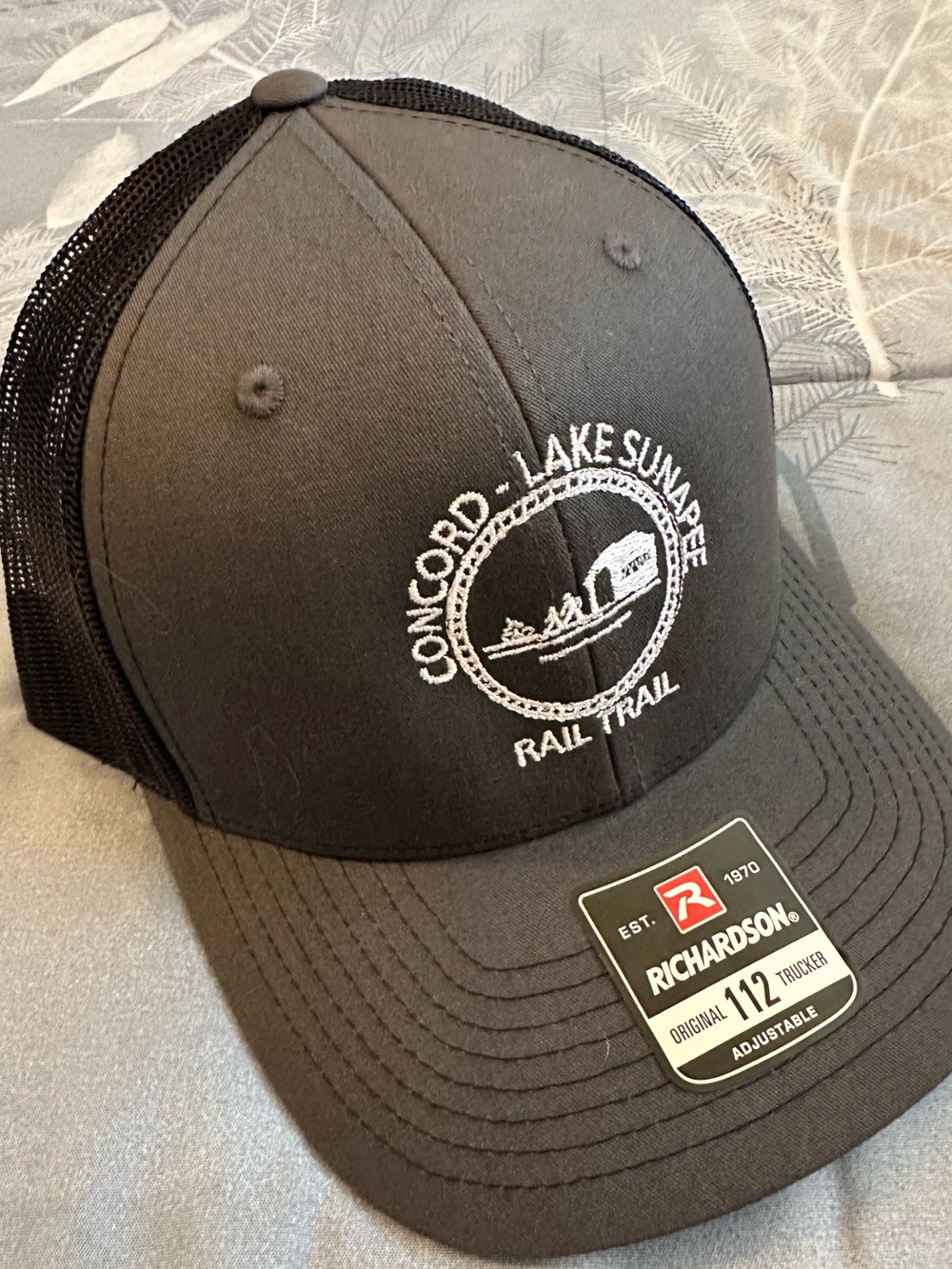 NWTS Concord - Lake Sunapee Rail Trail Black Richardson 112 Trucker Hat OS